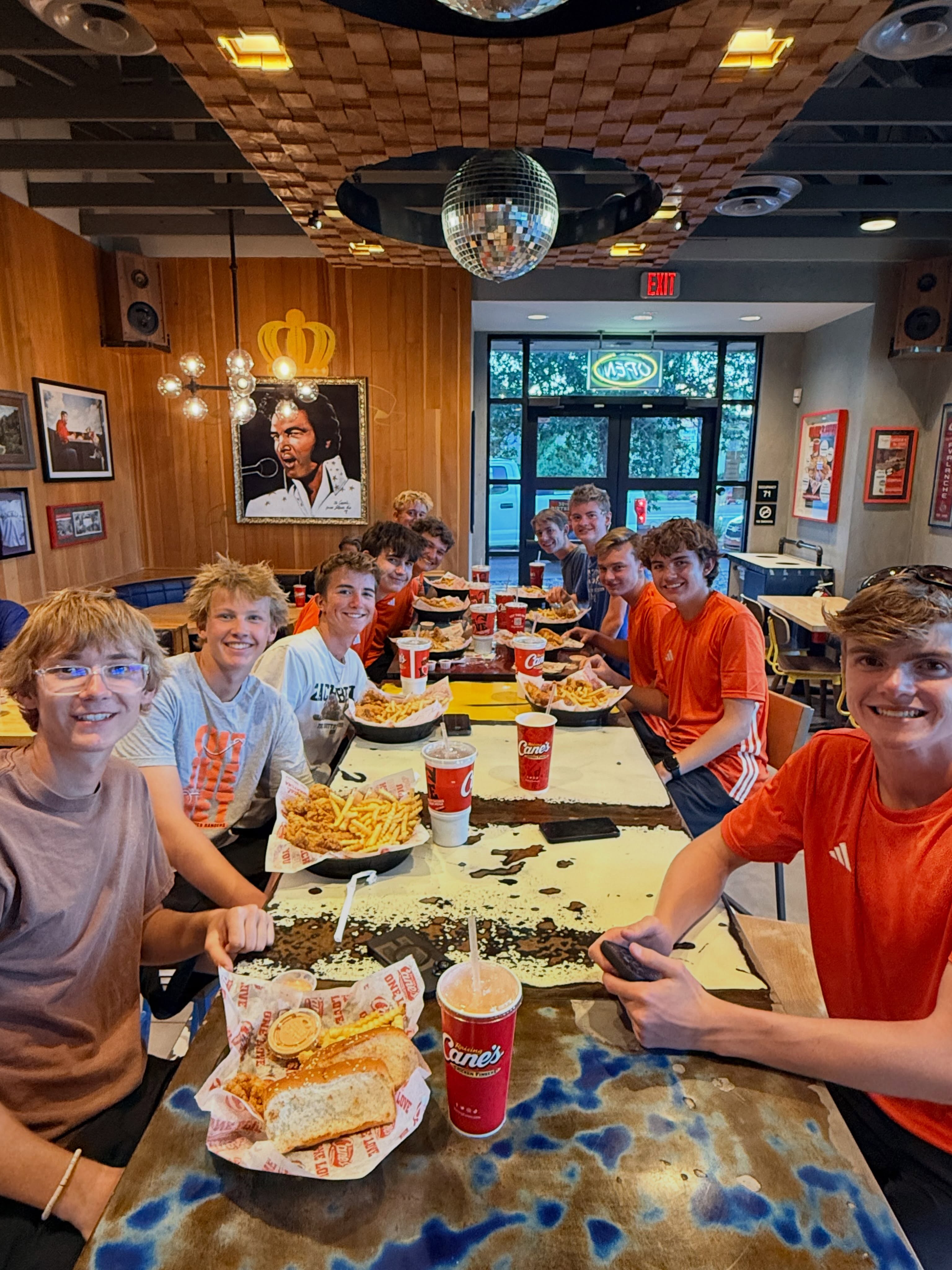 LP Boys Tennis supporting Girls on the Range at Cane’s! 🖤🧡🎾